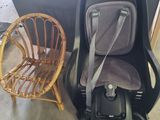 a baby car seat that is attached to a chair