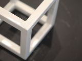 a small white object that is sitting on a table