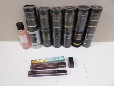 a lot of books and a tube of lipstick on the table