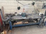 an image of a workbench with a lot of tools on it
