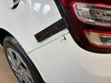 a close up of a car with a sticker on the back of it