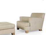 two chairs and a foot stool sitting next to each other on a white surface