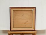 a picture of a painting on a wooden easel
