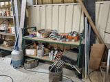 a room with a lot of tools on the shelves