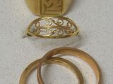 three rings and a ring with a gold ring on it