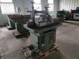 a machine that is sitting on a pallet in a warehouse