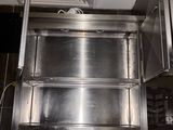 an overhead view of a commercial kitchen with stainless steel appliances