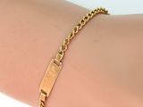 bracelet plaqué or avec une barre suspendue à une chaîne