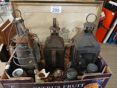 a box full of antique items on display in a store
