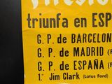 a yellow poster with a picture of a racing car on it