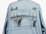 an image of a jacket with a drawing of a bridge on it