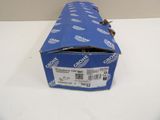 an open box of soda sitting on top of a white table