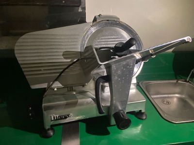 a machine that is sitting on a counter next to a sink