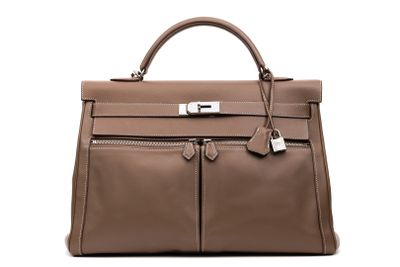 a brown leather handbag on a white background