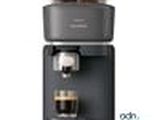an image of a coffee maker with two cups of coffee