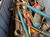 a bin full of tools that are sitting in it
