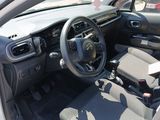 a picture of a car with a steering wheel and dashboard