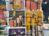 many greeting cards on display in a store