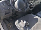a picture of a car with a steering wheel and dashboard