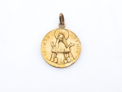 une pièce d'or à l'effigie de Jésus