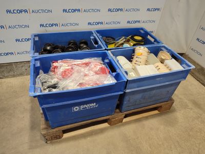 two blue bins that are sitting on a pallet
