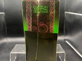 a glass display case with a green and pink design on it