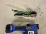 two tools that are laying on the floor