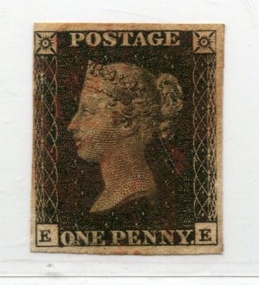 a close up of a stamp with a woman ' s face on it