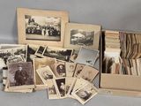 an old photo of a bunch of old photos in a box