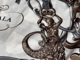 an image of a close up of a bag with a bird on it