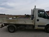 a white truck that is parked in a parking lot