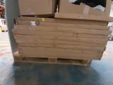 a pallet full of boxes sitting on a warehouse floor