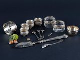a lot of silver items that are on a table