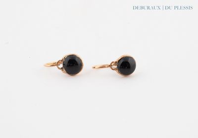 une paire de boucles d'oreilles en onyx noir serties de diamants