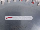 a circular saw blade on a piece of metal