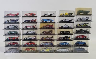 a lot of cars that are on display in a case