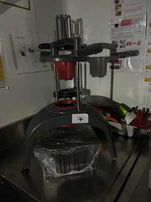 a machine that is sitting on a table in a kitchen