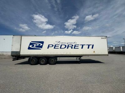 a semi truck that is parked in a parking lot