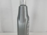 an image of a bottle of shampooe sitting on a table