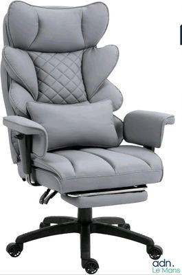 the office chair is made of leather and has a padded seat