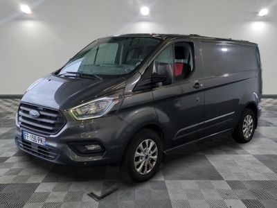 the new ford transit van is parked in a large room