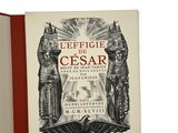 an open book with a picture of an egyptian statue on the cover