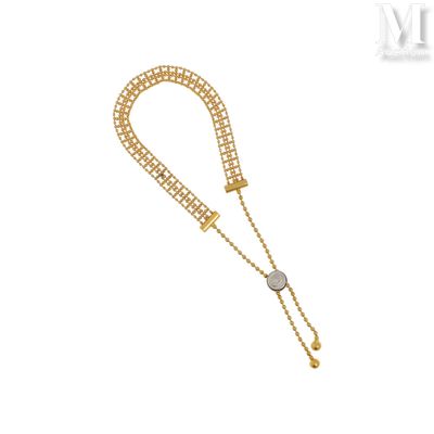 a gold and diamond bracelet with a clasp