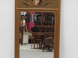 a mirror that has a picture of a woman on it