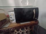 a microwave that is sitting on top of a table