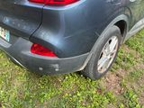 a car that is parked on the side of the road