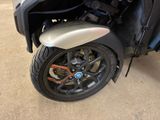a motorcycle that is parked in a garage