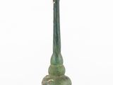 an image of a green vase sitting on top of a white surface