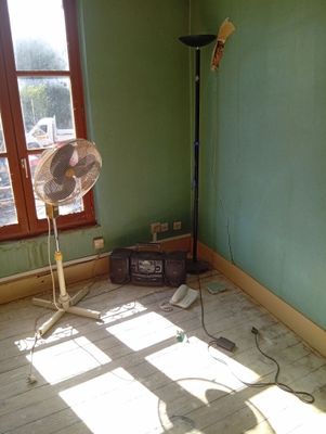 an image of a room with a fan in it