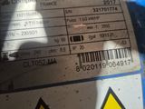 a close up of a label on a blue barrel